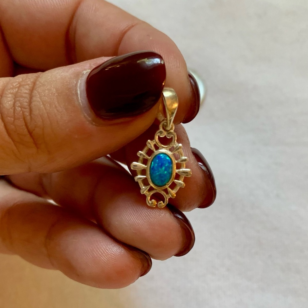 Blue fire opal sterling silver pendant